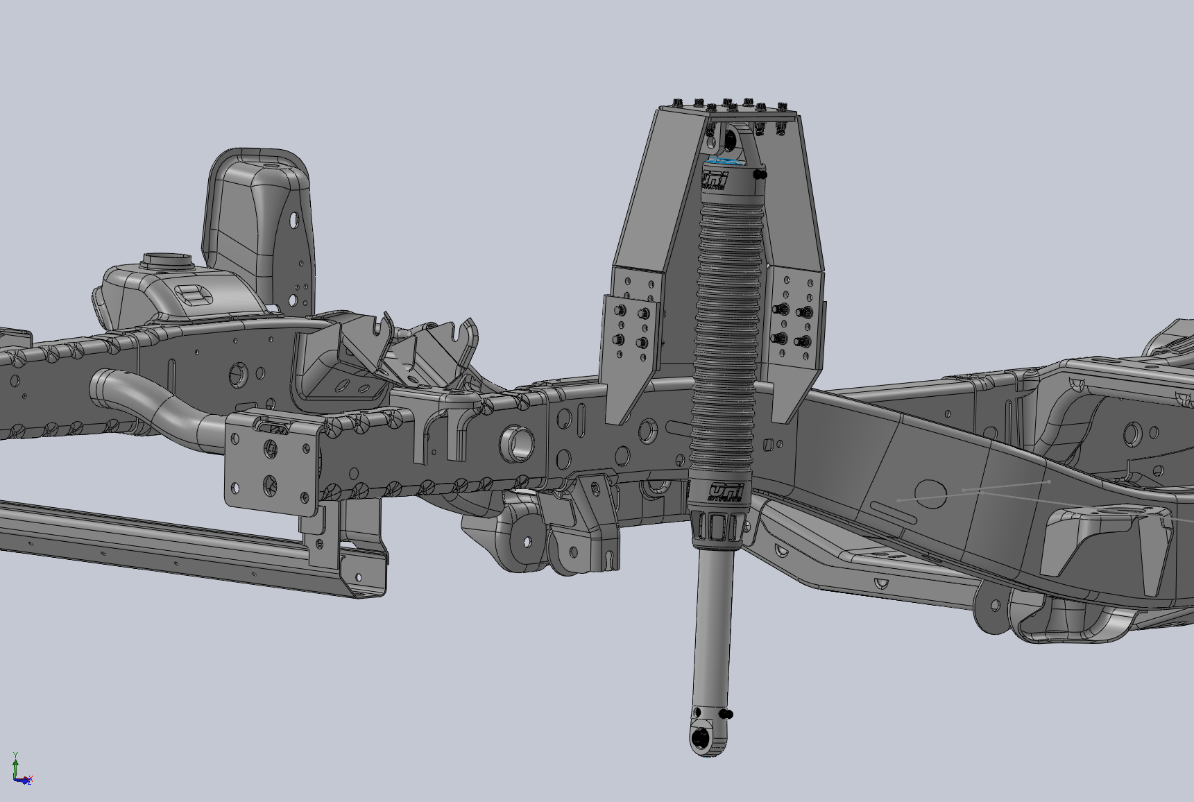 CAD model of an adjustable shock tower with an ORI mounted to the Jeep frame